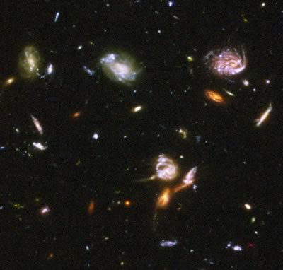 The Hubble Ultra-deep field shows diverse galaxies.